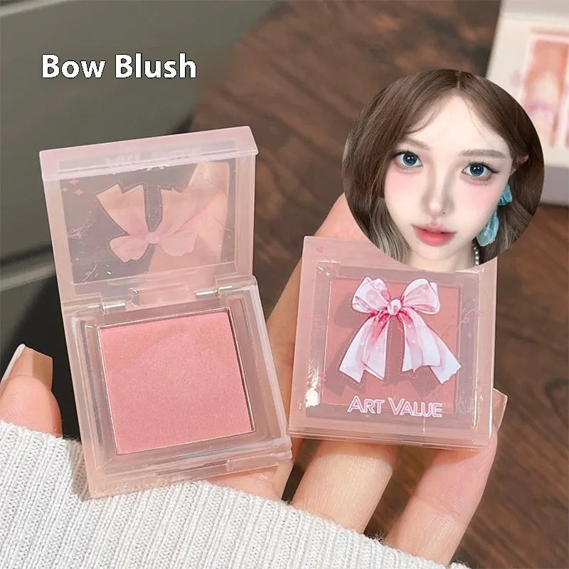 Butterfly Box makeup set with four matte lip muds, powder blusher compact and necklace in pink