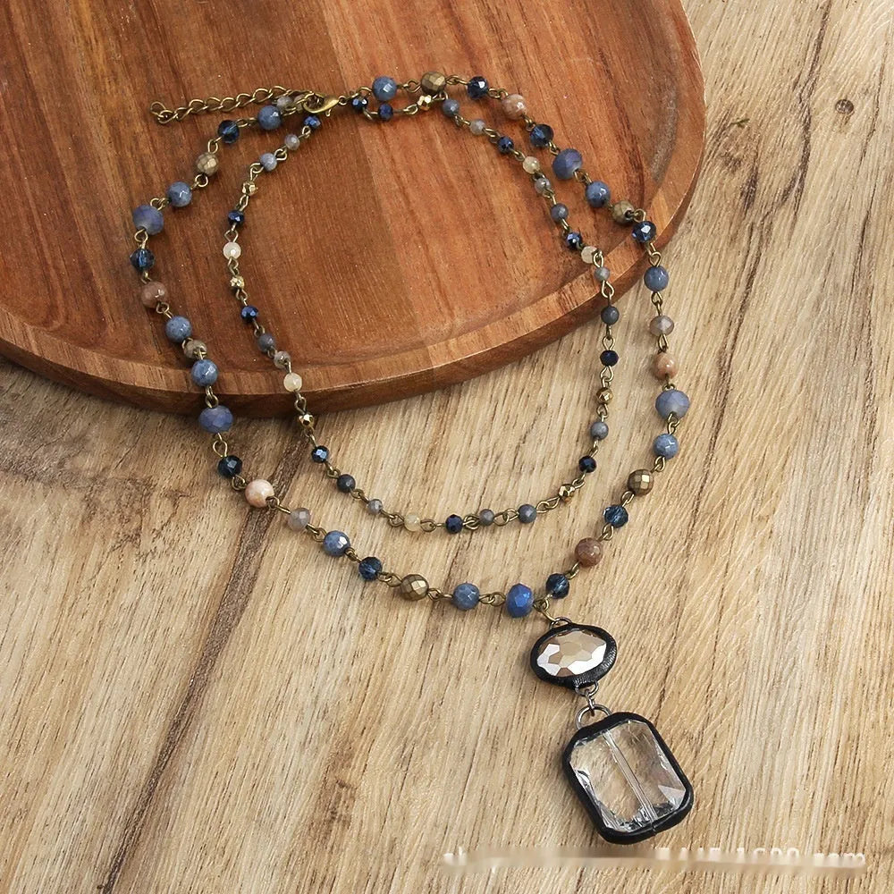 Two-layer tribal necklace with glass and natural stone pendant on adjustable alloy chain in beige colour