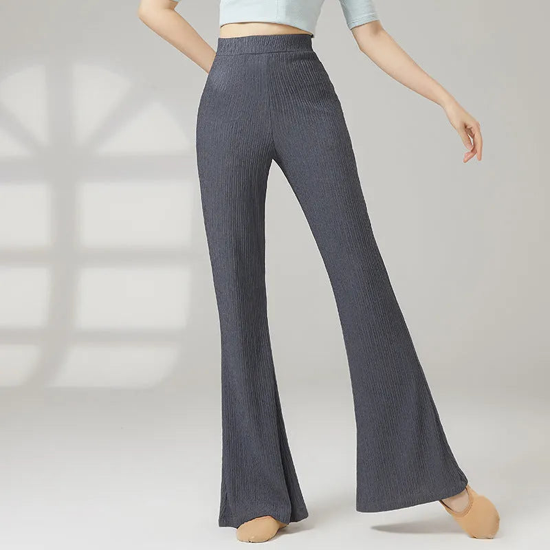 Women's solid colour dance practice trousers in polyester fabric for ballet training.