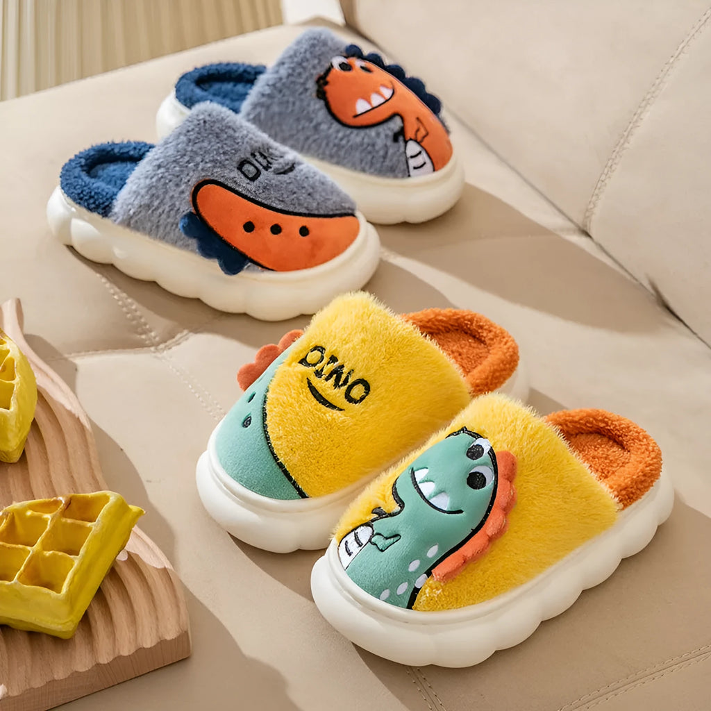 A pair of plush cotton couple slippers with dinosaur designs in coffee, grey, or orange-yellow, shown with a thickened sole.