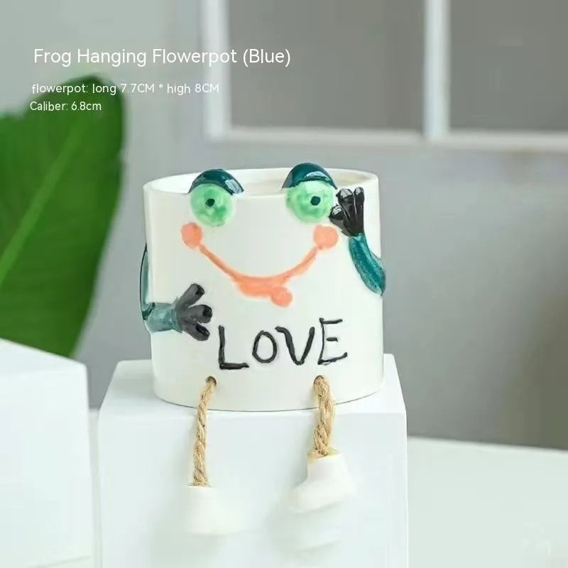Ceramic hanging foot flowerpot for succulent plants on desktop