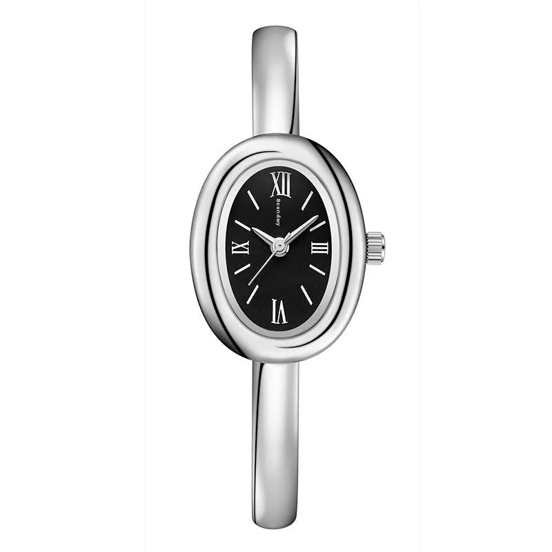 Women's oval retro quartz watch with 8mm thickness showing gold and silver colour options with spiral patterns