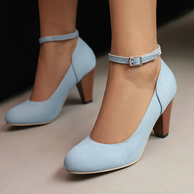 Blue denim women's platform heels with buckle closure and waterproof construction