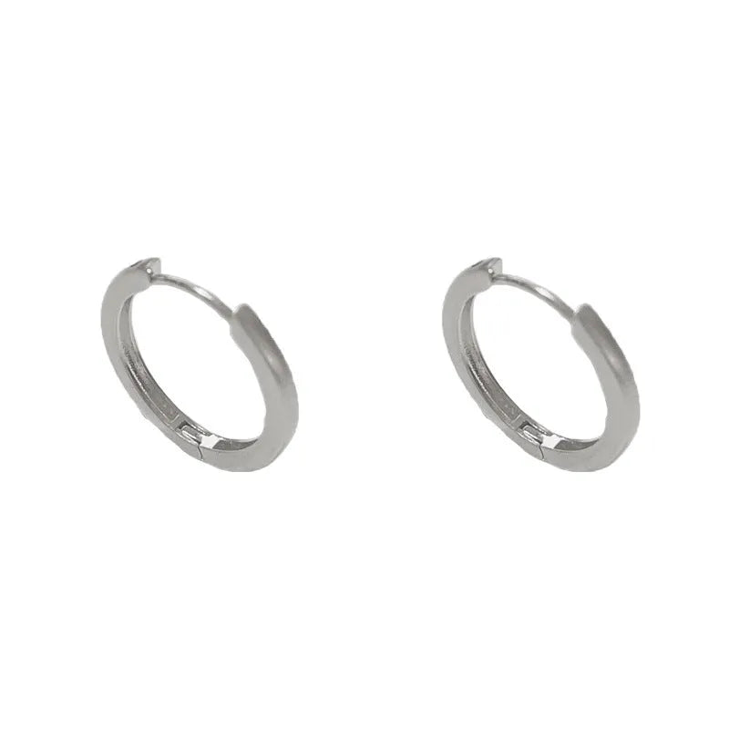 Circular geometric copper ear clips for women with gold or silver finish