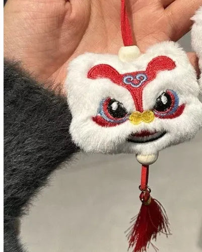 Chinese style plush lion keychain ornament with star stone details in blue or yellow colour