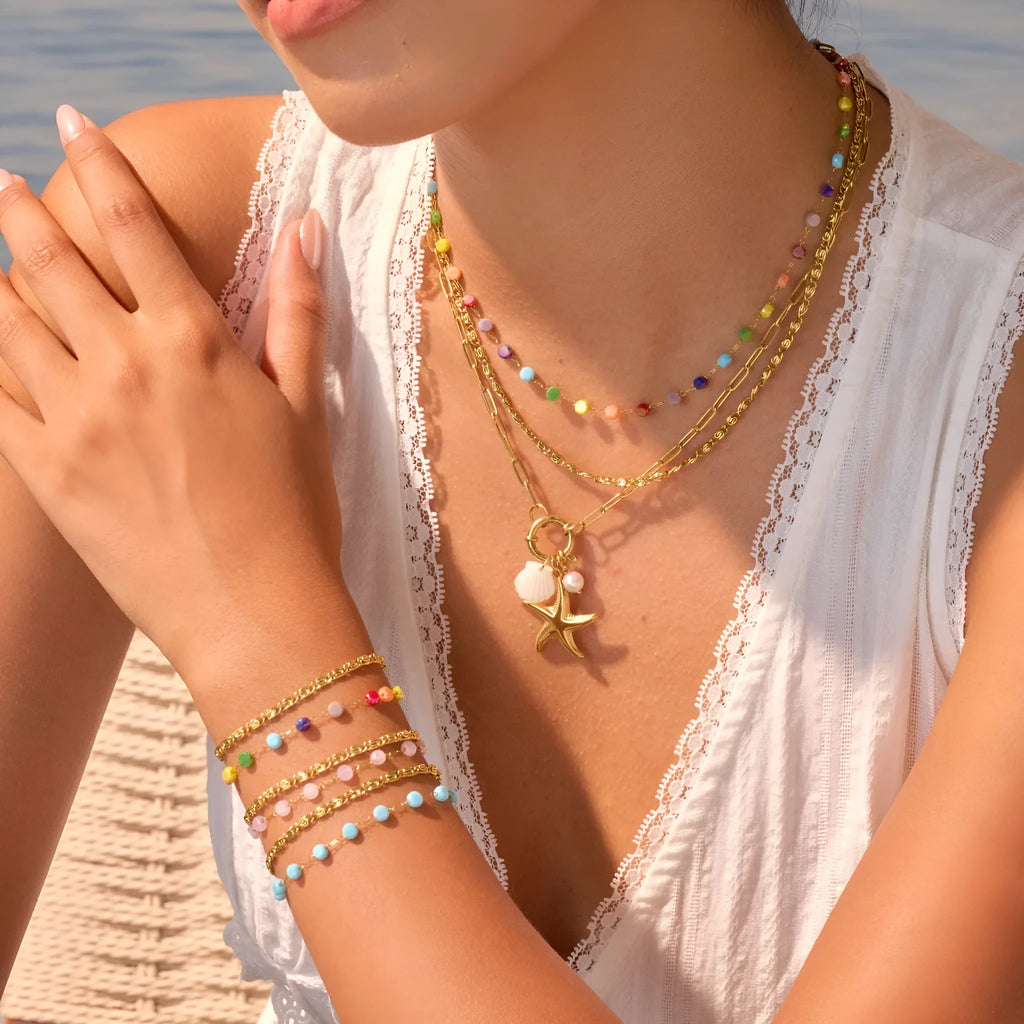 Colorful beaded stainless steel gold-plated double layer clavicle necklace for women on white background