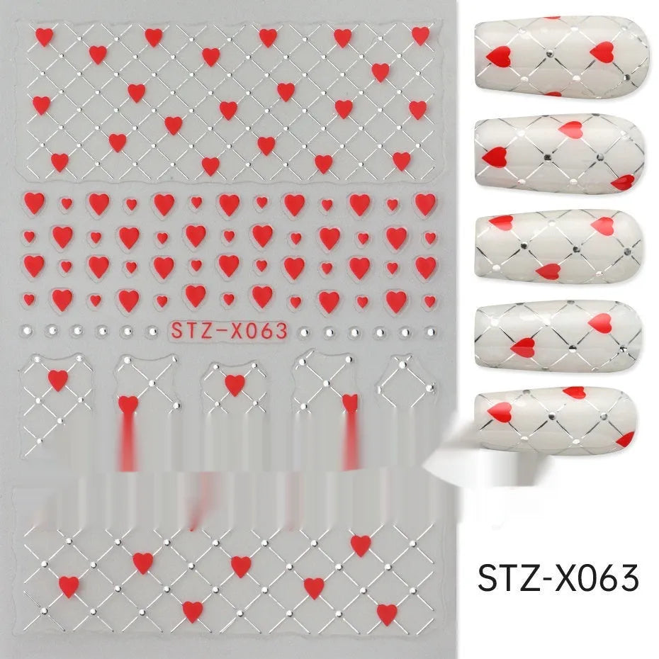 Sheet of black and silver love heart pattern nail art stickers with a plastic nail patch.