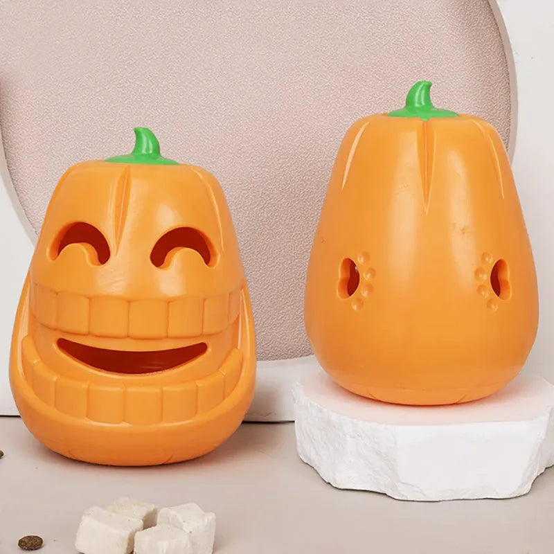 Orange Halloween pumpkin shaped interactive dog chew toy with a treat dispensing funnel.