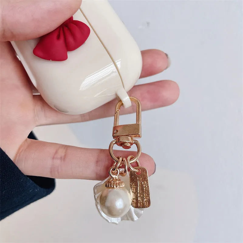 Beige red tpu protective case for AirPods Pro with a bow design on the shell.
