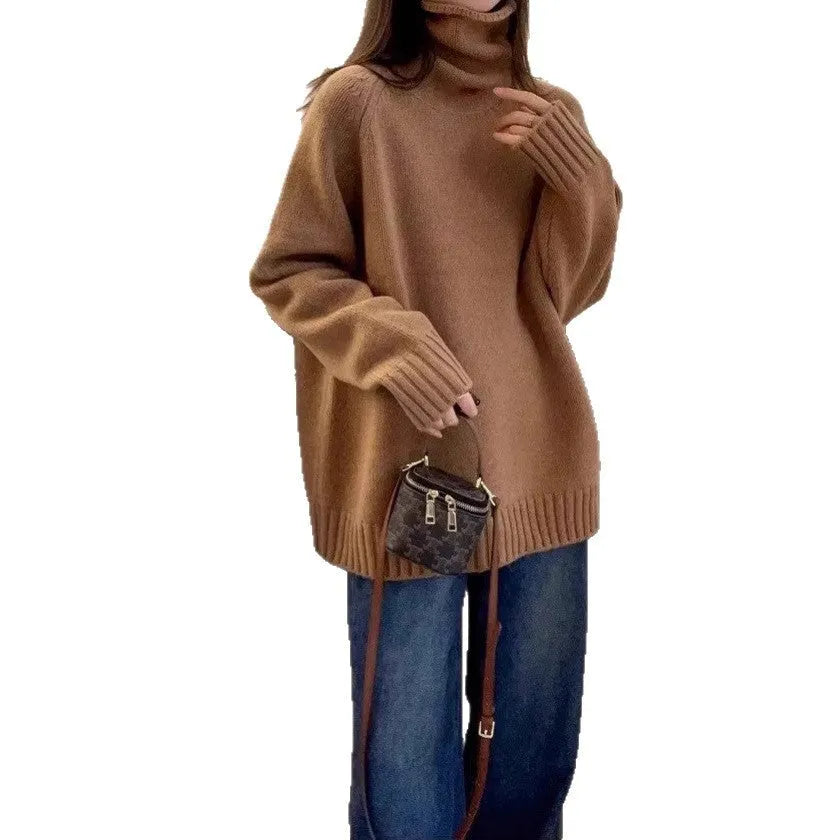 Red women's loose turtleneck sweater with a thick, textured curling pile collar.