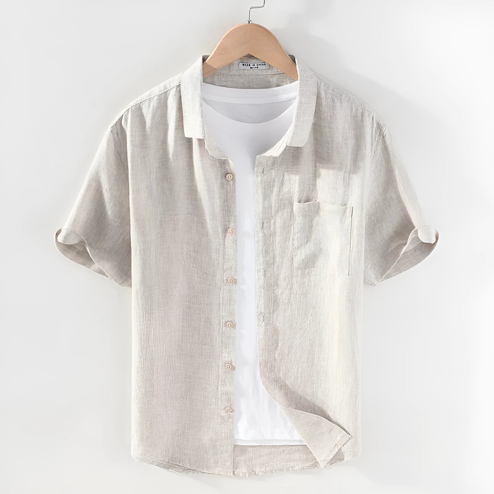 Men's raw jute linen short sleeve shirt with square collar on hanger