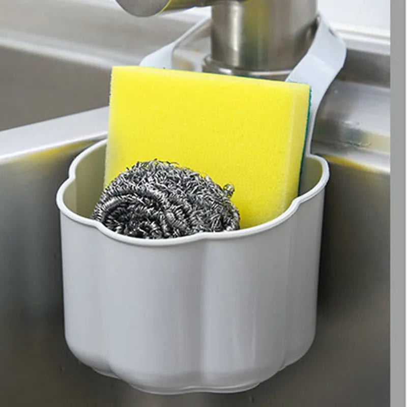Plastic sink drain basket in Nordic style, shown in dark blue, measuring 20 cm long by 10 cm wide.