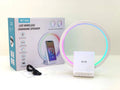 White smart Bluetooth speaker with ambient light ring and wireless charging surface