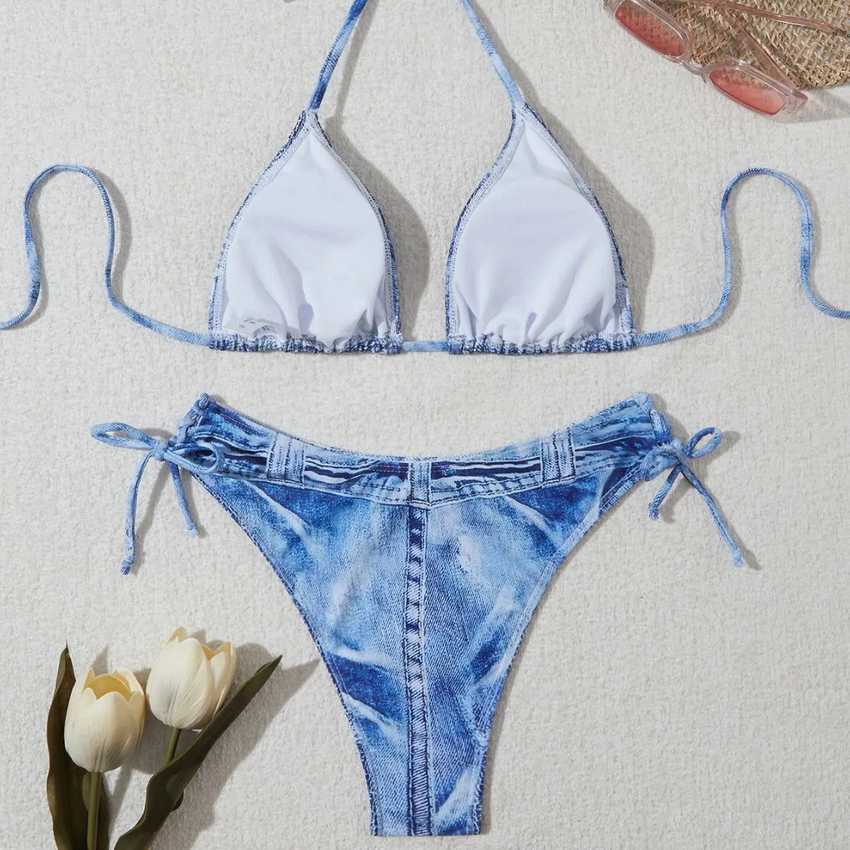 Women's denim blue printed bikini with adjustable straps, shown front view