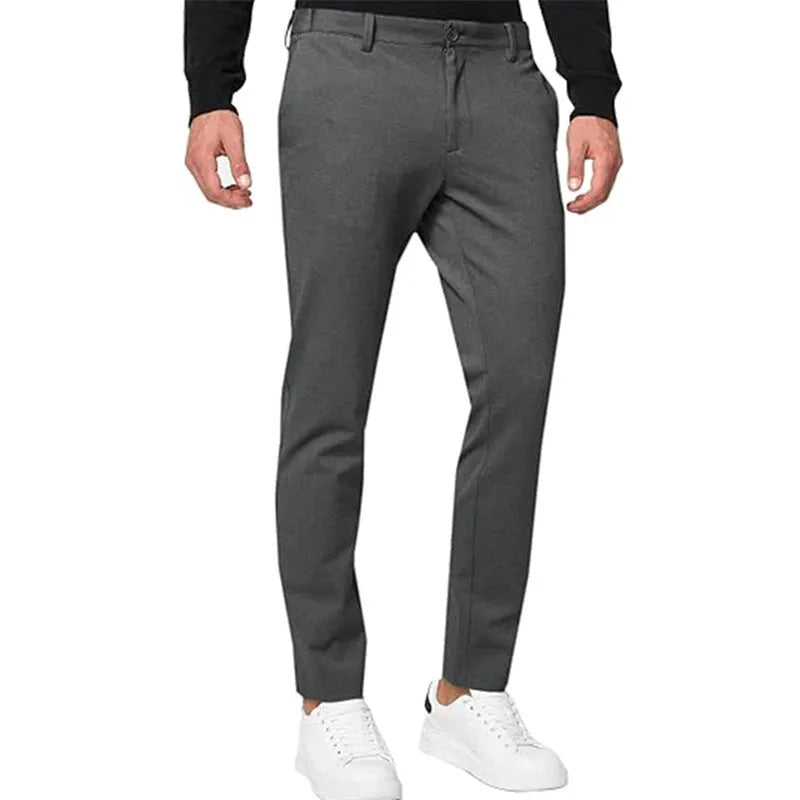 Men's slim-fit tapered chino trousers in stretch cotton blend fabric with pleated front detail