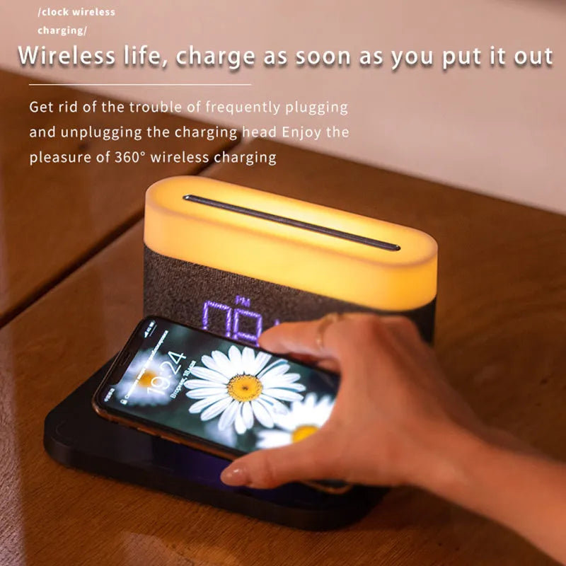 Black wireless charging desktop station with digital clock display and night light function