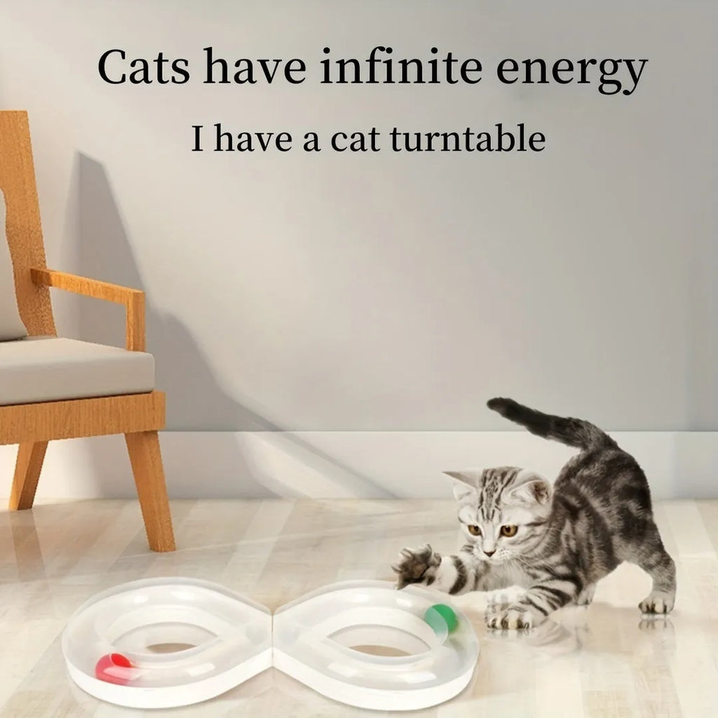 Blue and white cat turntable toy with ball track and teasing stick on wooden floor