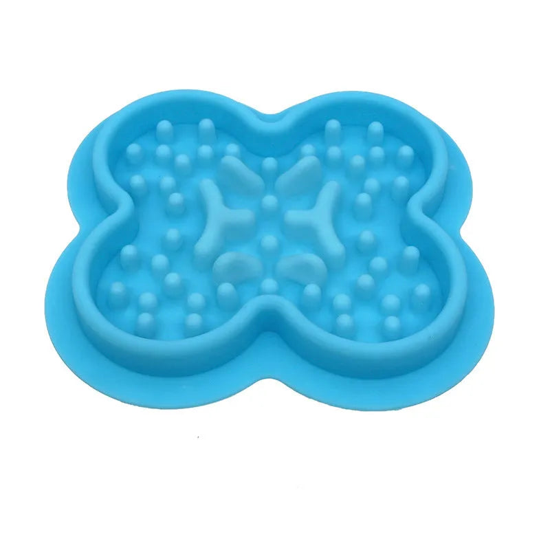 Blue silicone pet licking pad with textured surface and raised edges for slow feeding.