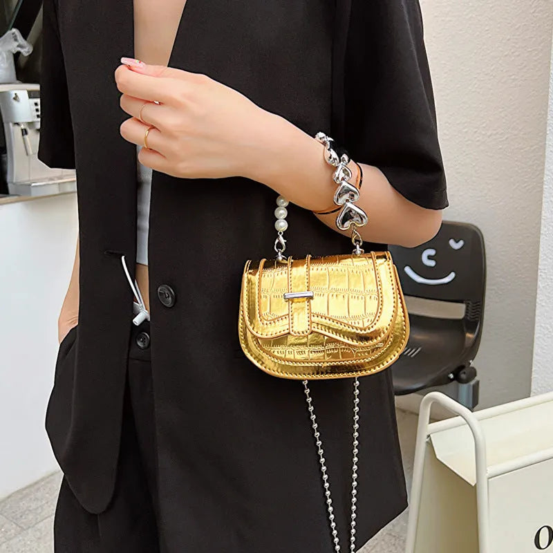 Horizontal square mini saddle bag in PU leather with sandwich pocket detail and adjustable shoulder strap
