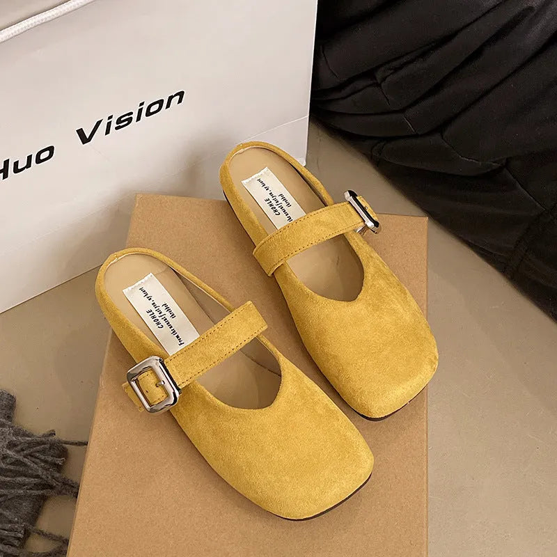 Women's flat closed toe slippers in apricot colour with a square toe and rubber sole.