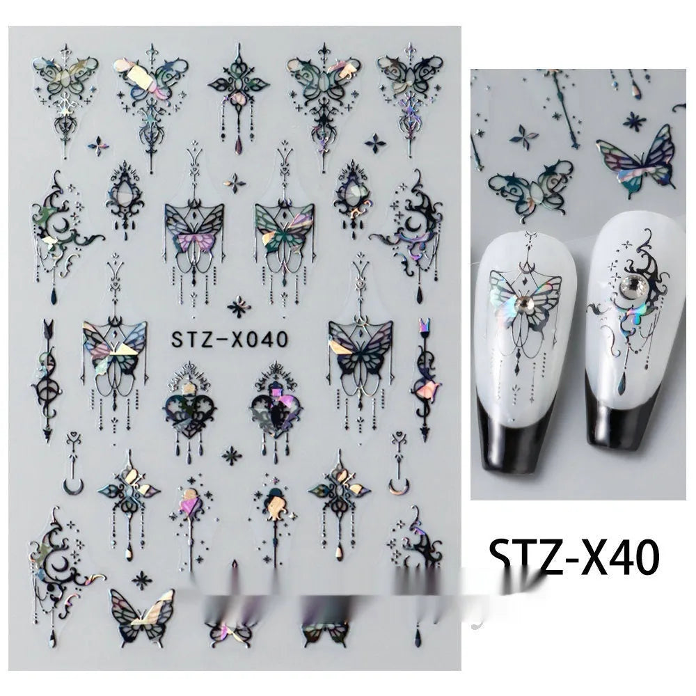 Sheet of black and silver love heart pattern nail art stickers with a plastic nail patch.