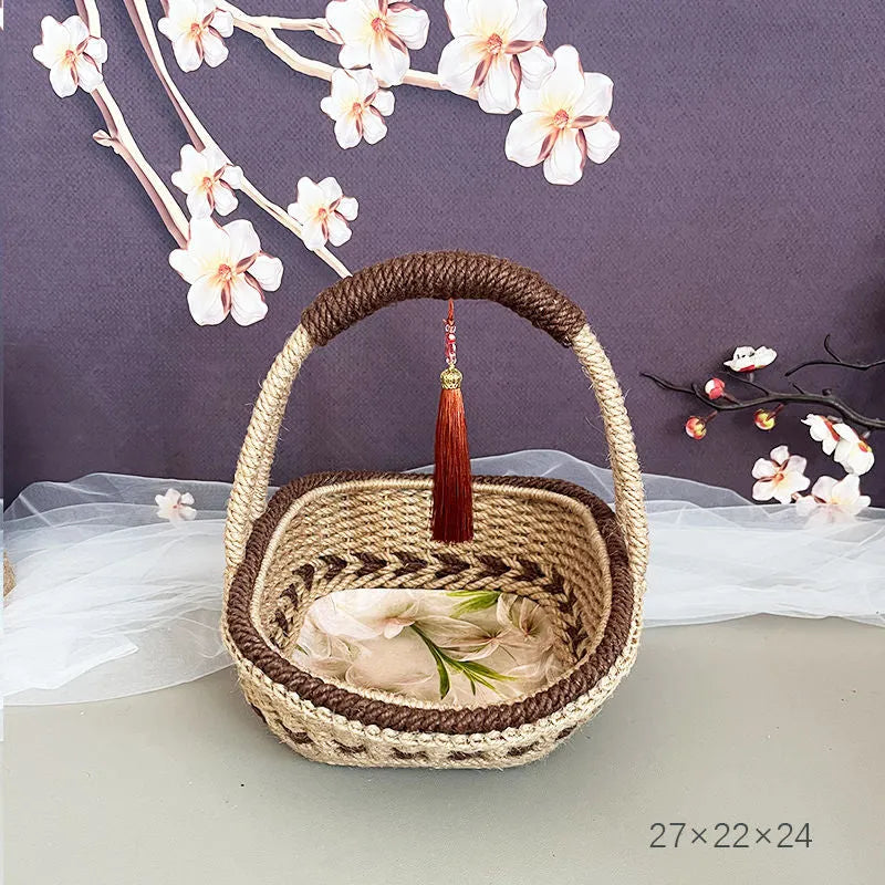 Hand-woven hemp rope basket in rustic coffee brown colour, measuring 19cm by 12cm.