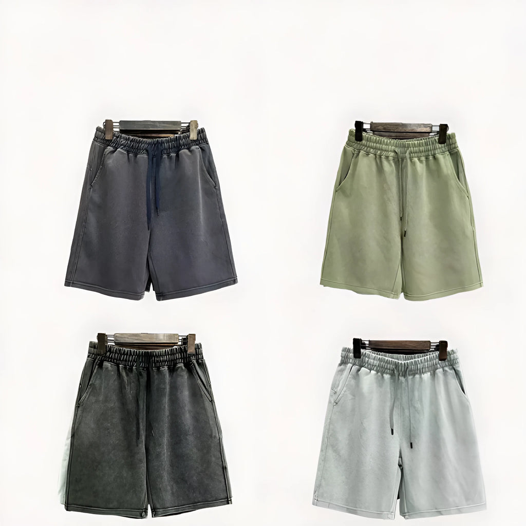 Men's cotton shorts with distressed detailing in straight-leg loose fit