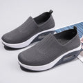 Women's mesh outdoor running shoes in beige colour with round toe design and air cushion