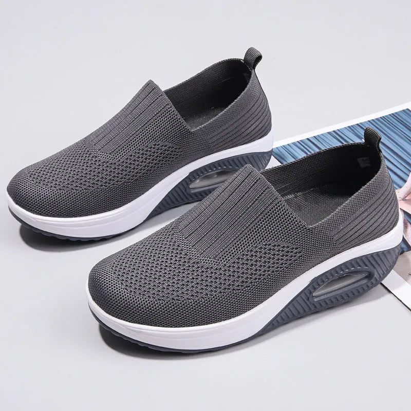 Women's mesh outdoor running shoes in beige colour with round toe design and air cushion