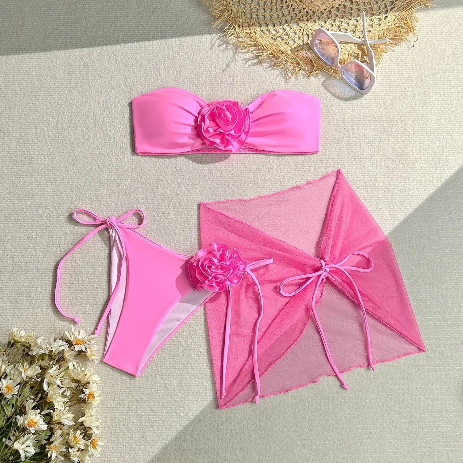 Women's pink swimsuit tube top with three-dimensional flower tie design and matching skirt