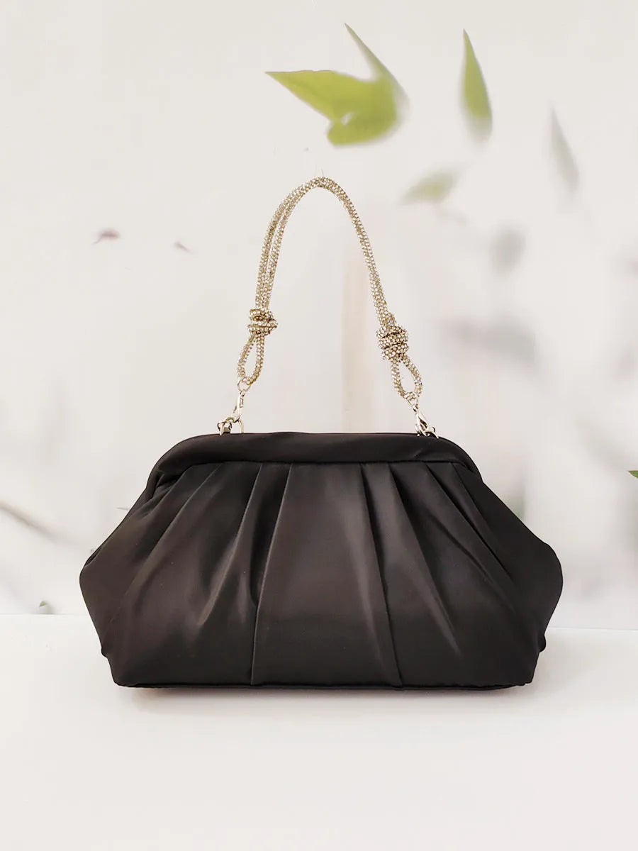 Women's soft polyester crossbody bag in shell shape with chain decoration and internal document organiser