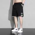 Boys' plus size cotton shorts in overalls style, shown in black, khaki and white.