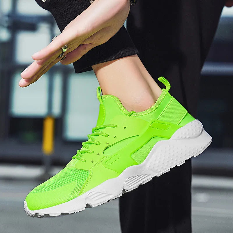 Men's low top casual shoes with cross shoulder straps in fluorescent red, green, or yellow.