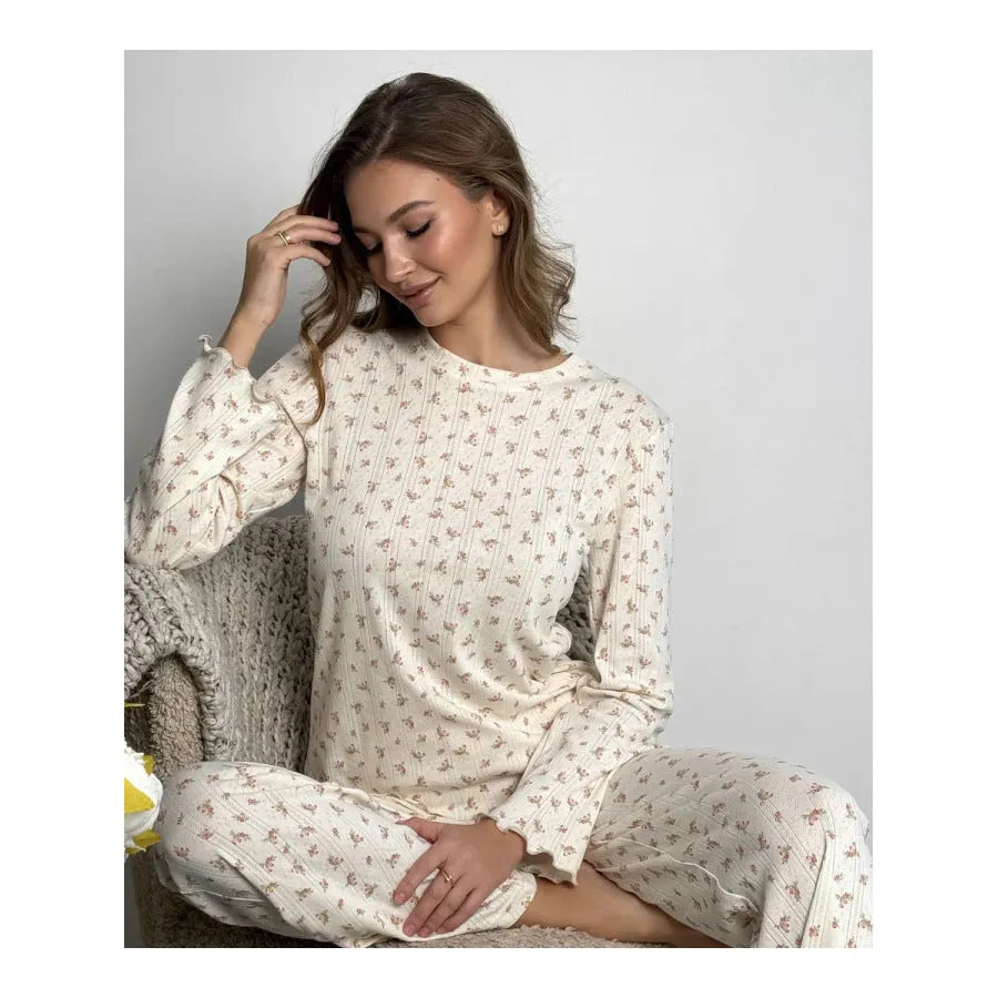 Women's white floral print lounge suit with bell sleeve top and wide leg trousers