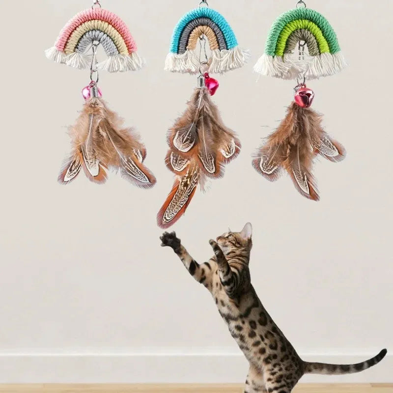 Colourful feather cat rope toy hanging from a door with elastic swing and sticky buckle clamp