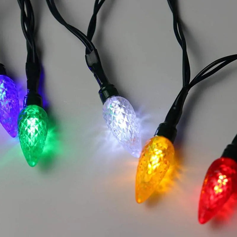 Green USB charging cable with 10 small LED lights illuminated along its length for festive decoration.