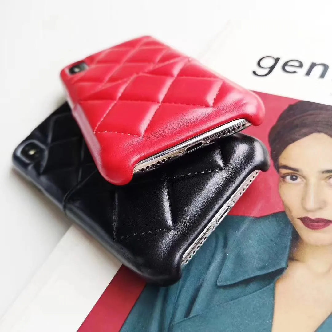 Genuine leather phone case for Apple iPhone in black, pink and red colour options.