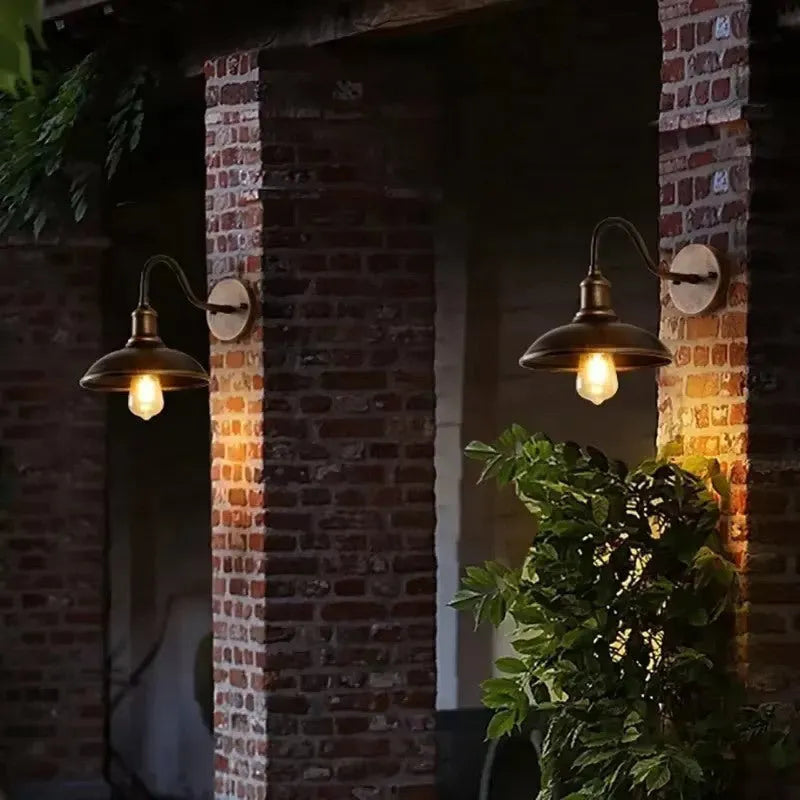 Retro style villa courtyard wall lamp in silver or copper finish with angled mounting options