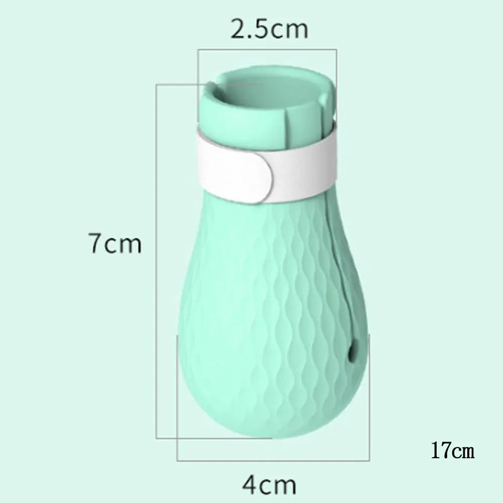 Four green silicone cat anti-scratch foot covers for paw protection during washing and medical care