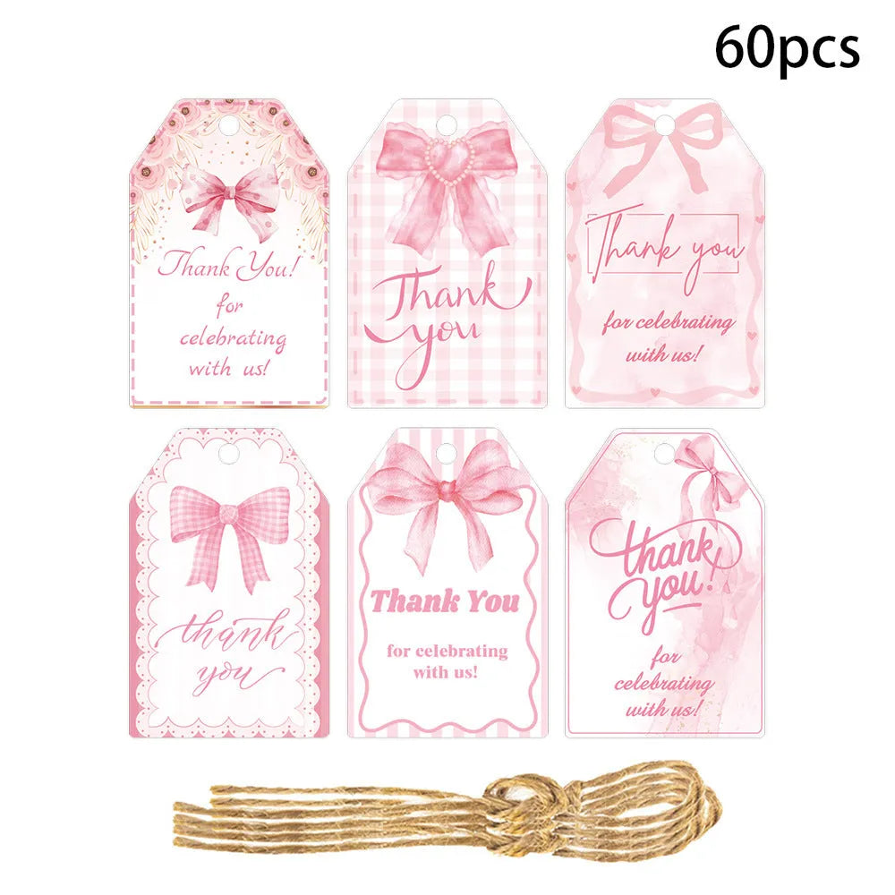 Three styles of creative bowknot paper gift tags with natural hemp rope for party decorations