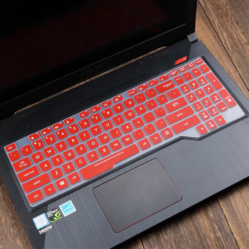 ASUS Flight laptop keyboard protective film cover shown in gradient blue on a laptop