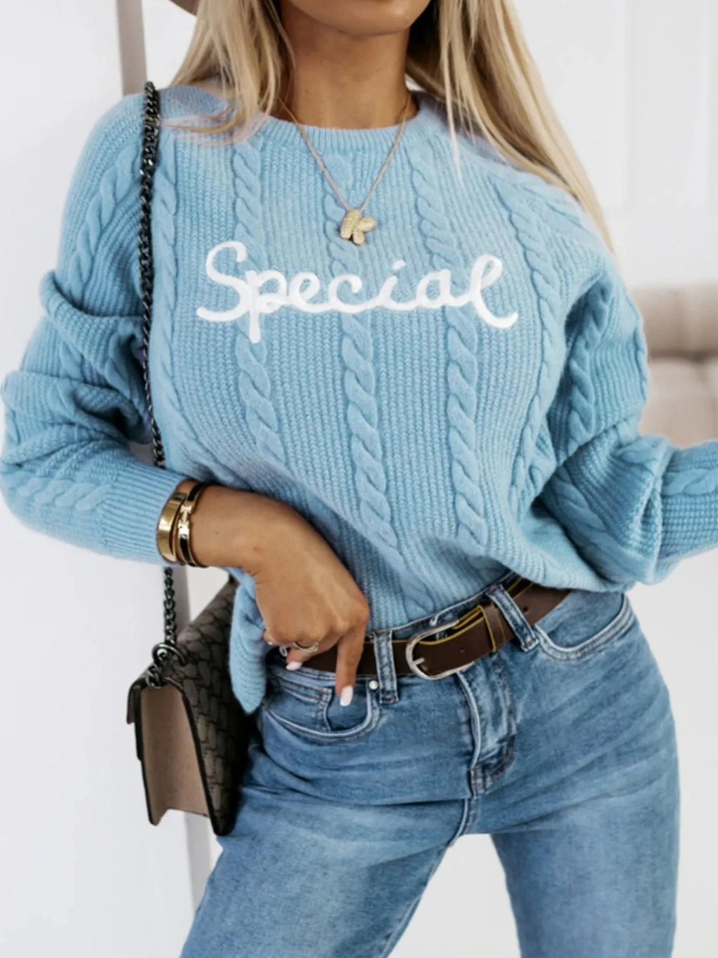 Blue leisure pullover sweater with embroidered letters detail on front