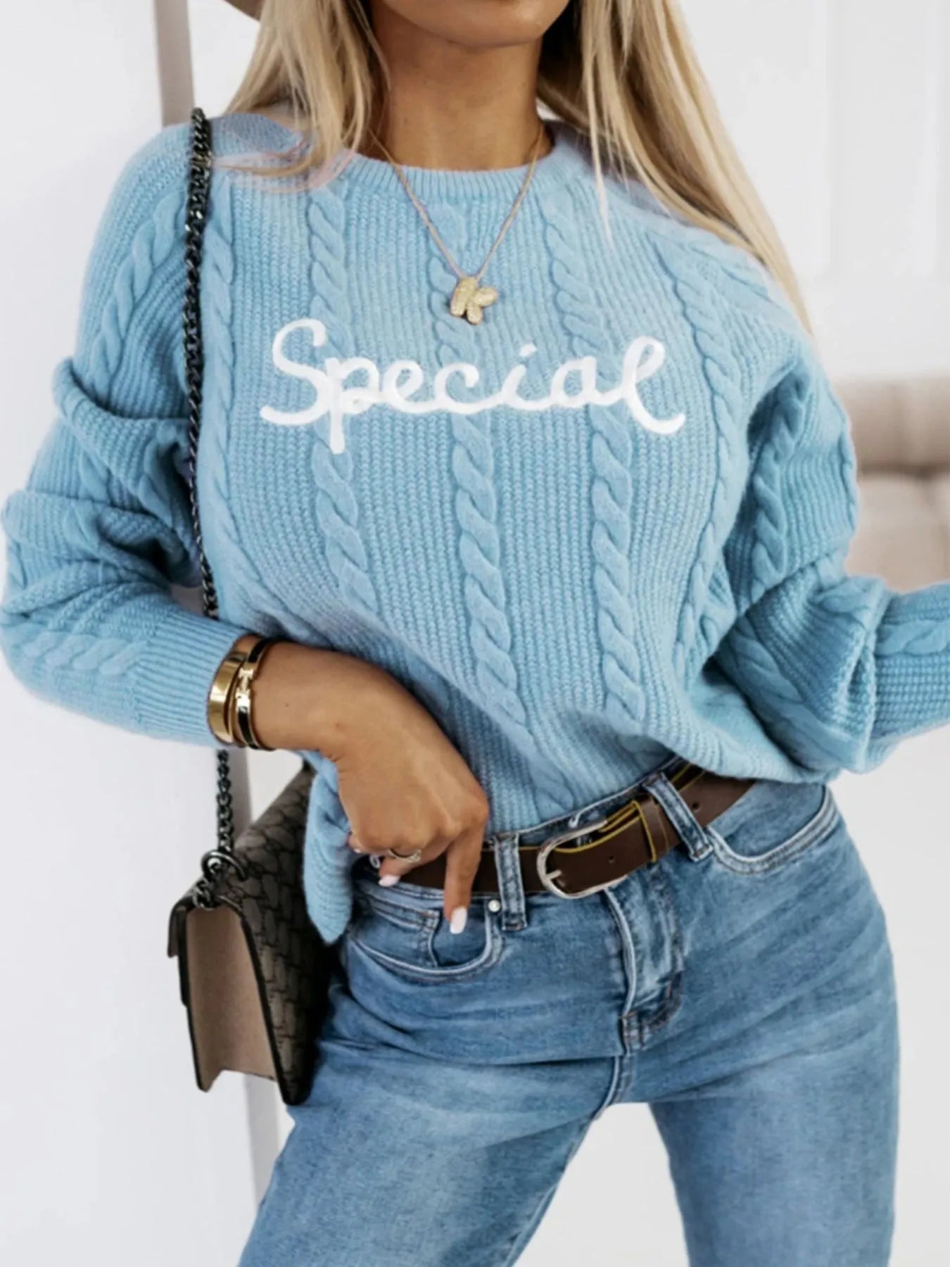 Blue leisure pullover sweater with embroidered letters detail on front
