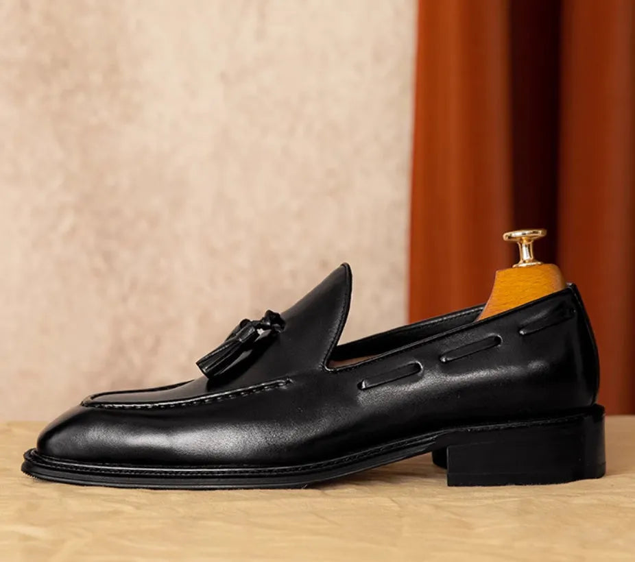 Men's black genuine leather slip-on loafers with fringed design and rubber sole