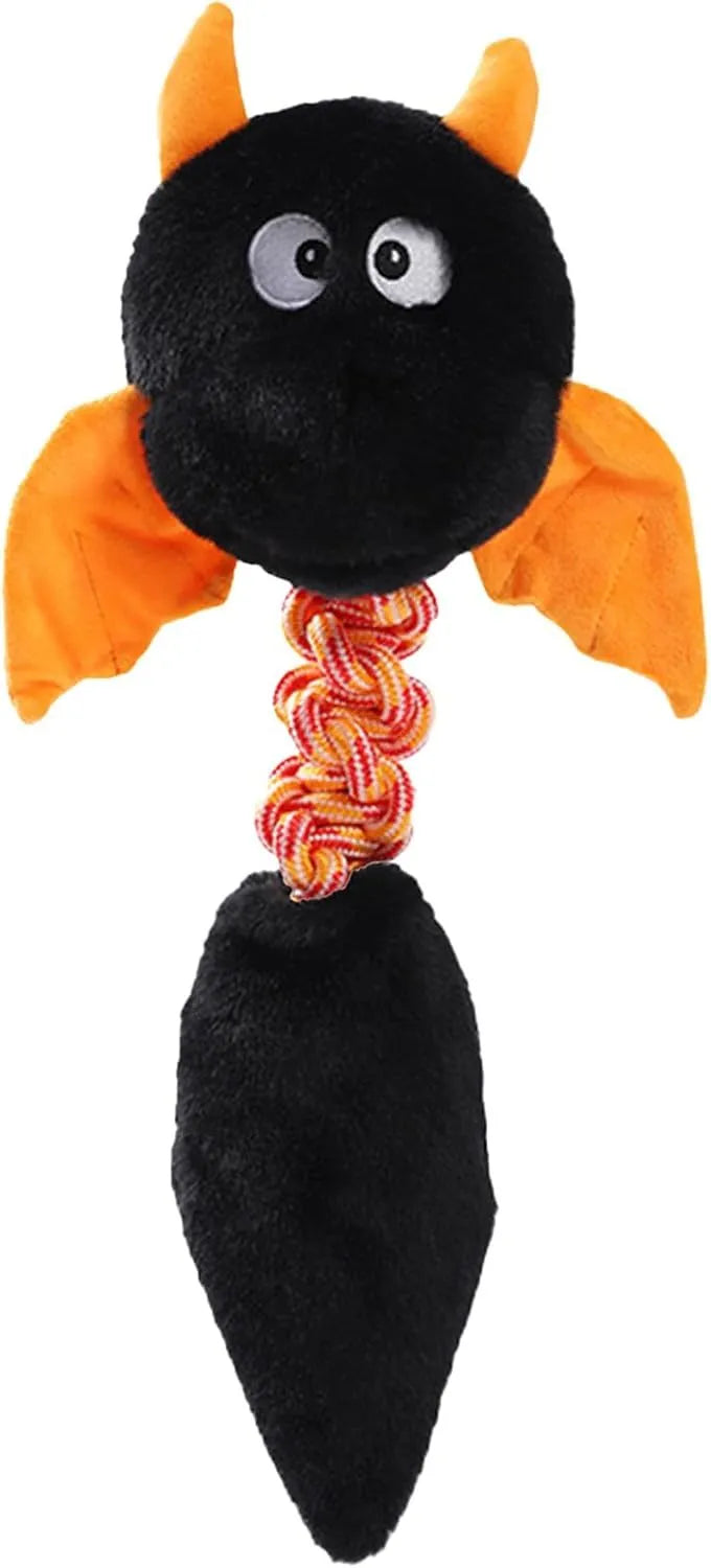 Large black plush dog toy with cartoon design, a rope knot, and a squeaker for chew play.