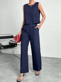 Red polyester two-piece women's set with sleeveless top and wide-leg trousers