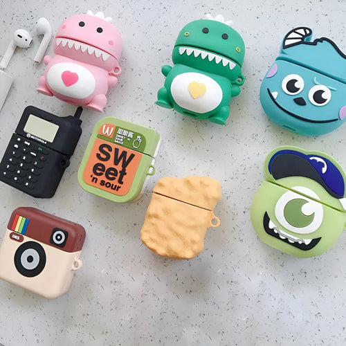 Green silicone case for AirPods 1/2 with a cartoon animal design on a white background.