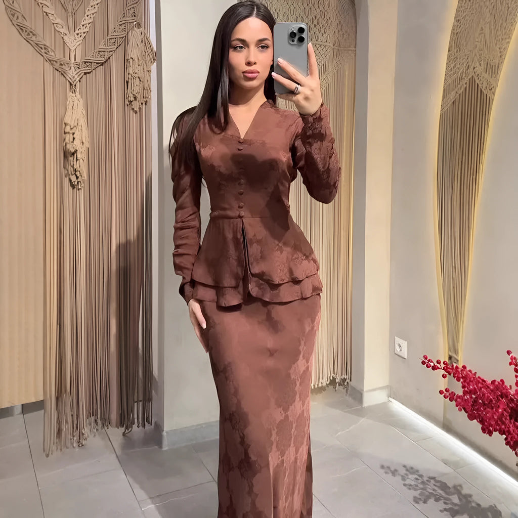 Dark brown retro dress with floral pattern, long sleeves, slim fit silhouette and button detailing
