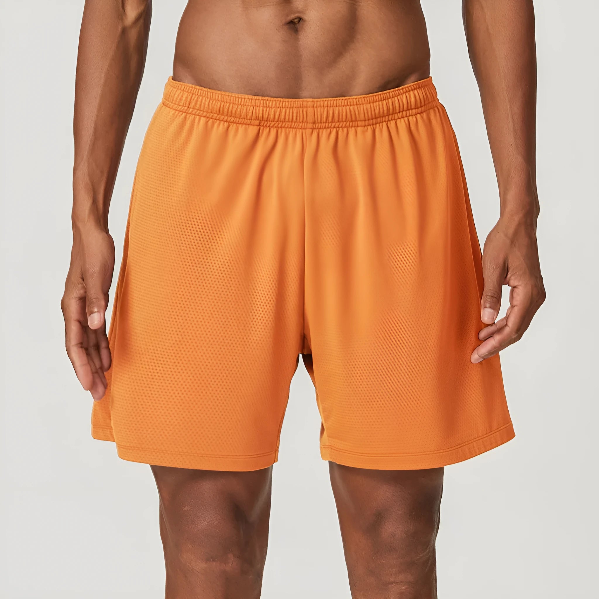 Men's quick-dry double-layer running shorts in various colours on a neutral background.