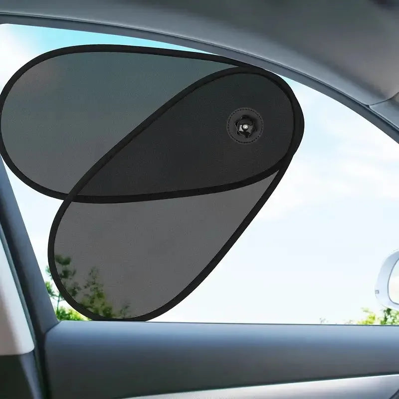 Breathable car window shade stretched on side window with suction cups visible